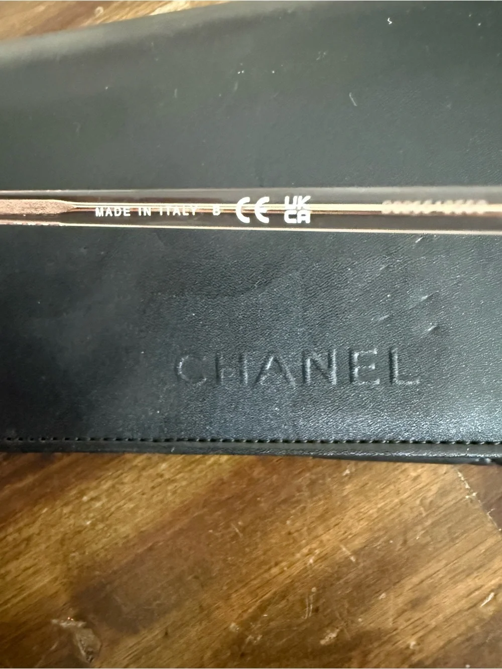 CHANEL Transparent Light Pink Round Sunglasses with Dark Lenses